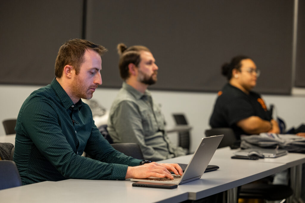 students in classroom on computers