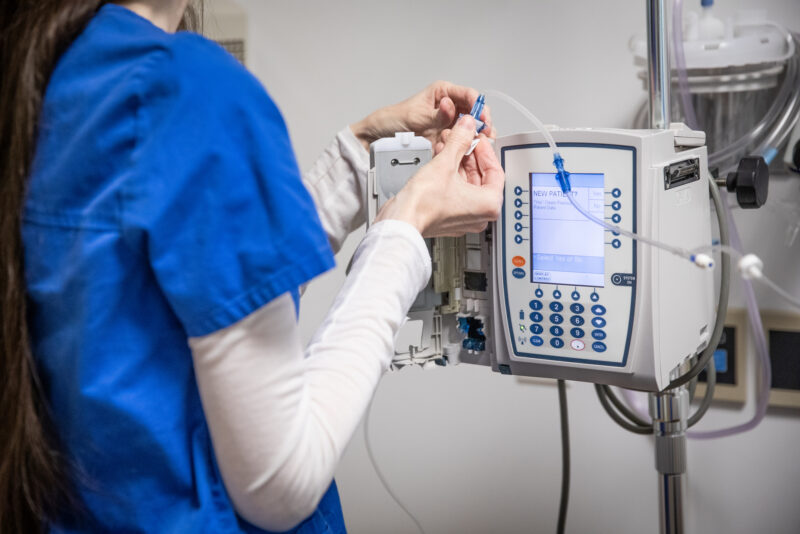 nursing student working with monitors