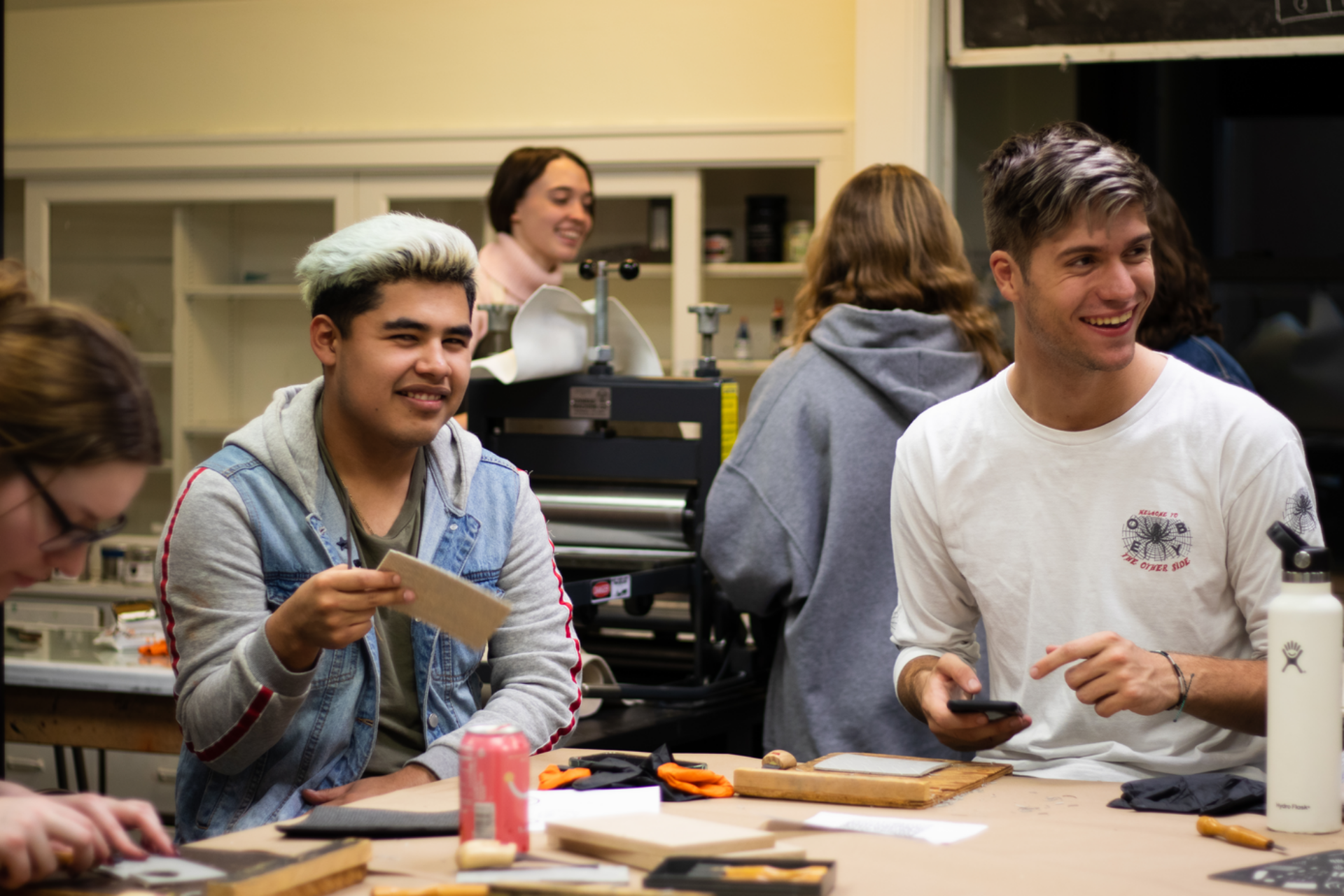 Students working together in an art classroom.