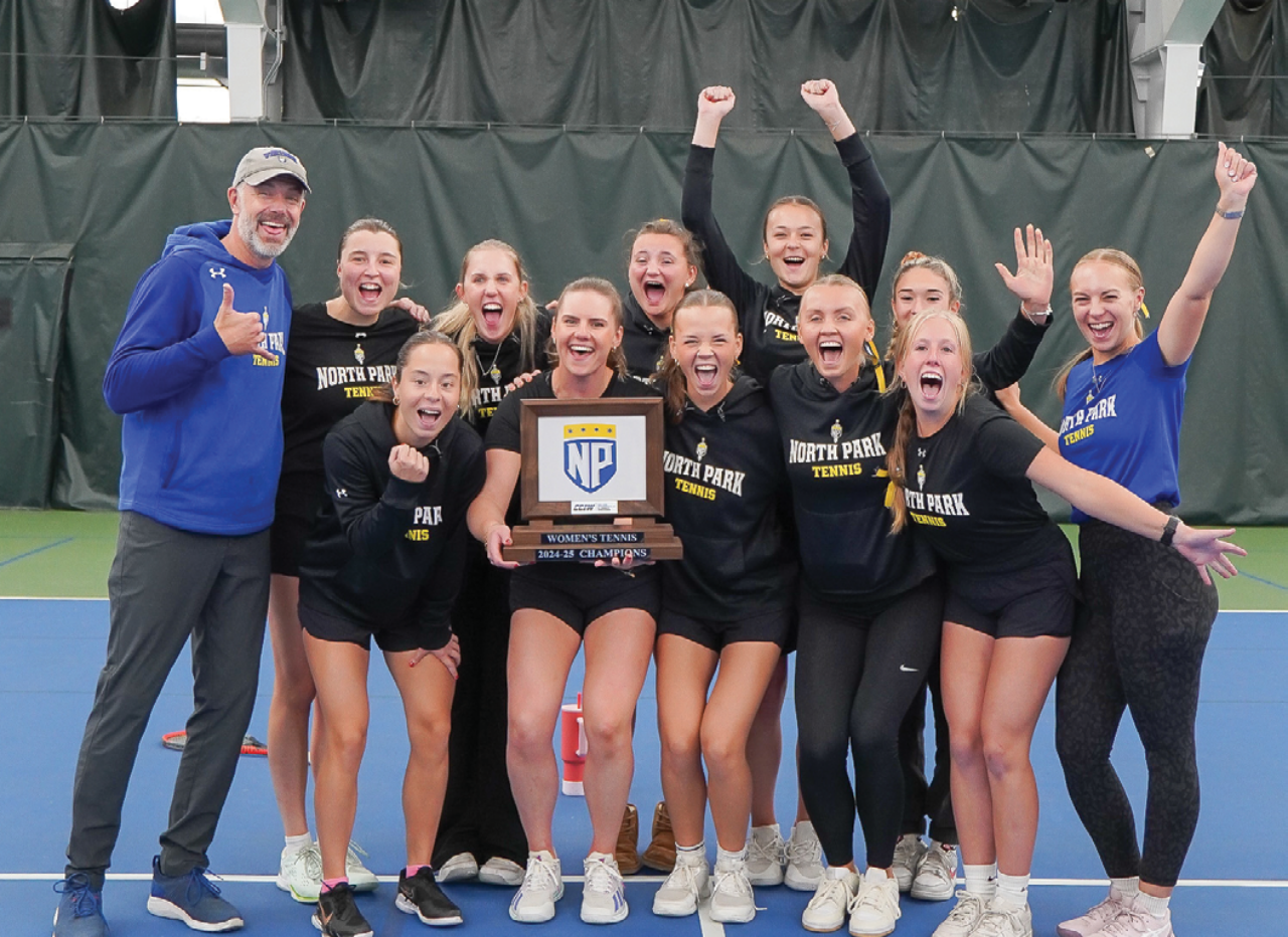 North Park women’s tennis team holding the CCIW championship placque